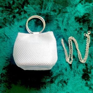 NWOT Silver Wristlet. Metal Handle & crossbody chain strap.
